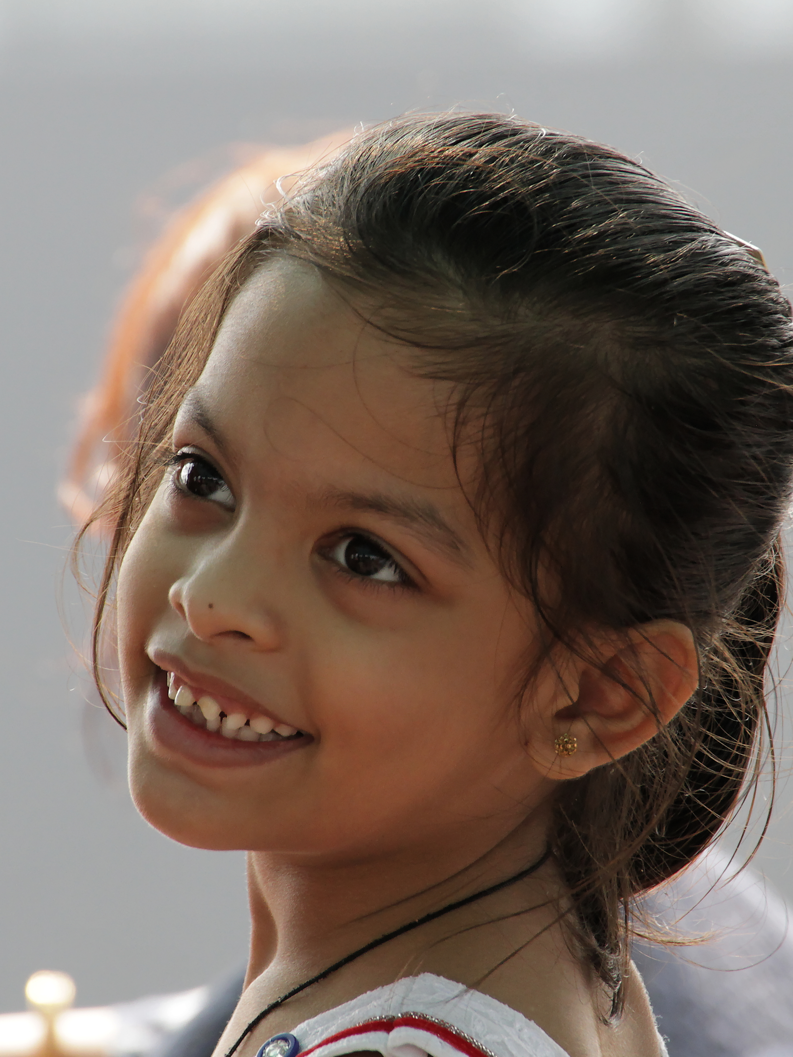 Happy girl - on a ferry to elephanta